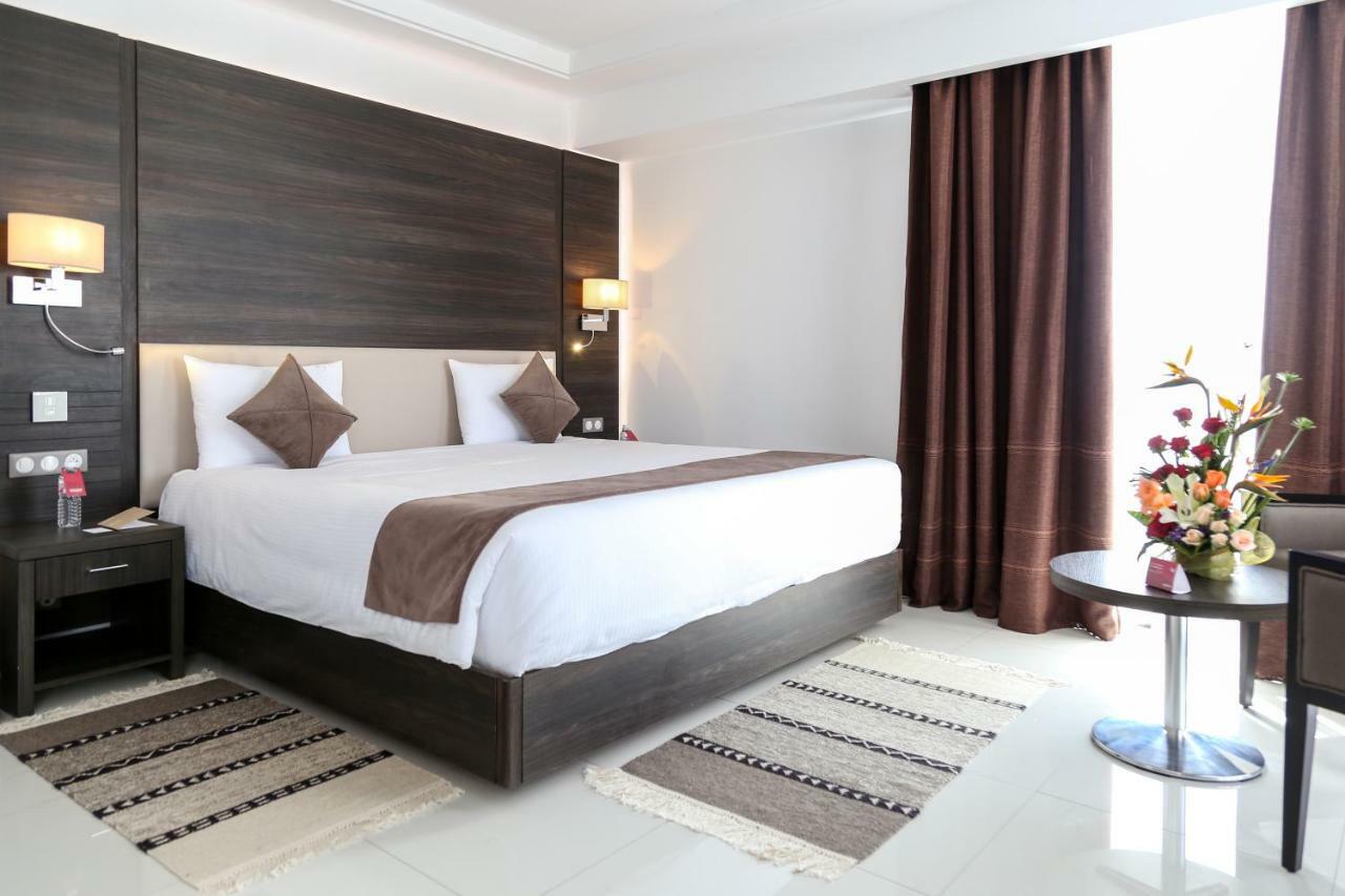 Radisson Hotel Sfax Exteriér fotografie A bedroom in a hotel